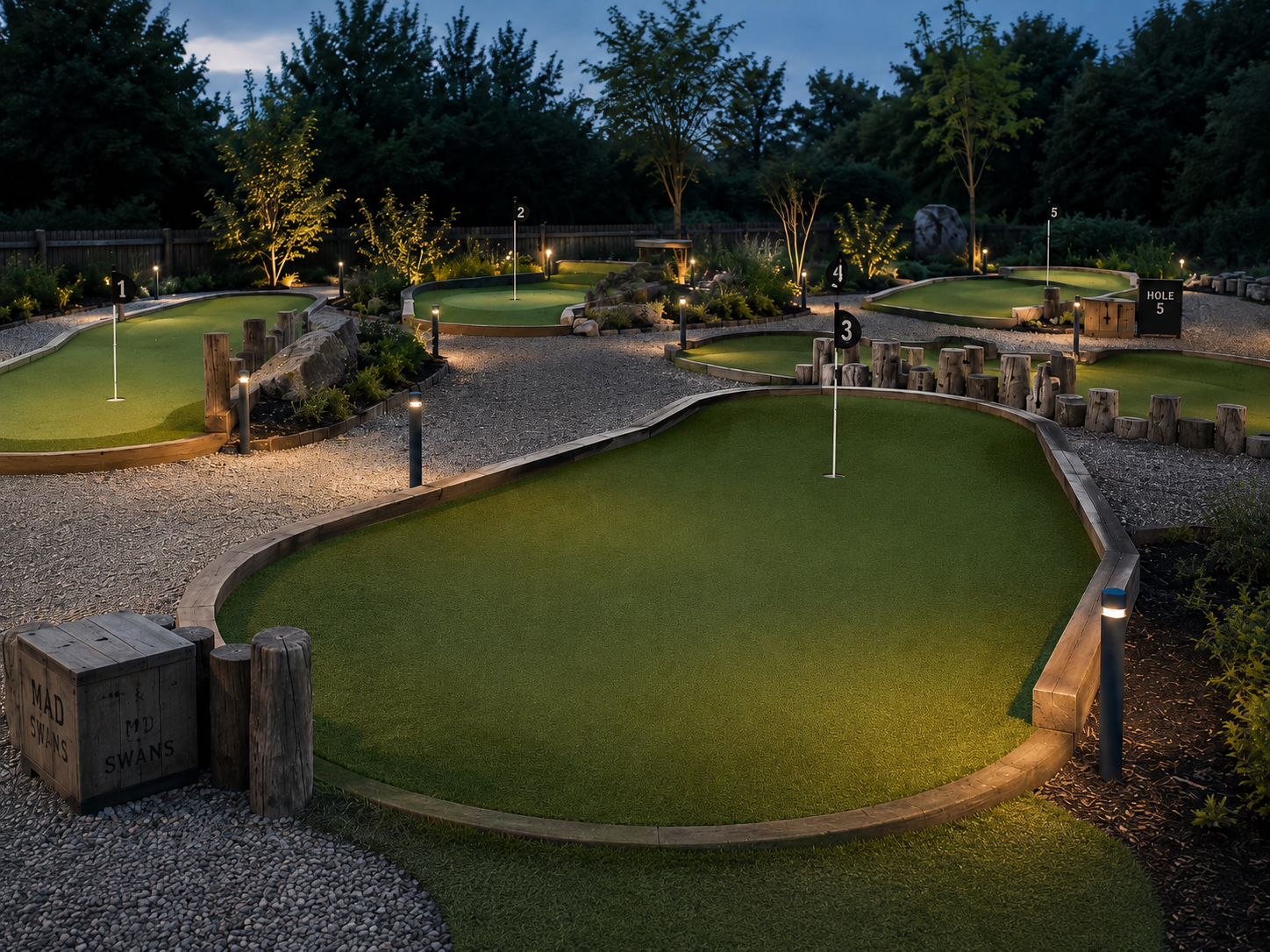 Floodlit landscaped mini golf course at dusk with numbered holes, timber edging and planted borders